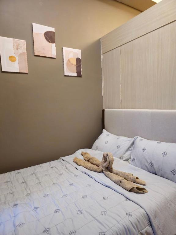 Postel nebo postele na pokoji v ubytování Serene Suite In Jazz Residences