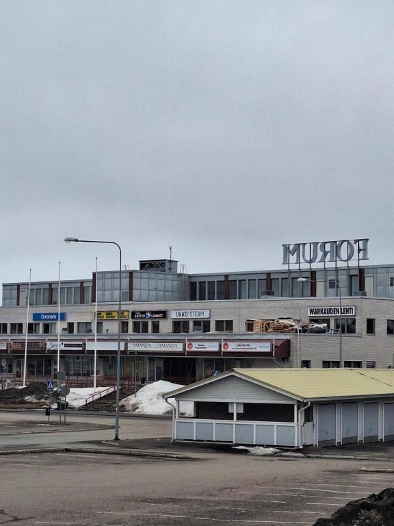 a building with a kruitt sign on top of it at Kauppakatu 57 - 8 in Varkaus