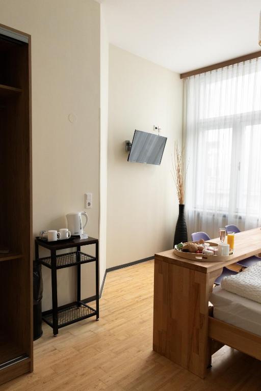 Un televizor și/sau centru de divertisment la Pension a und a
