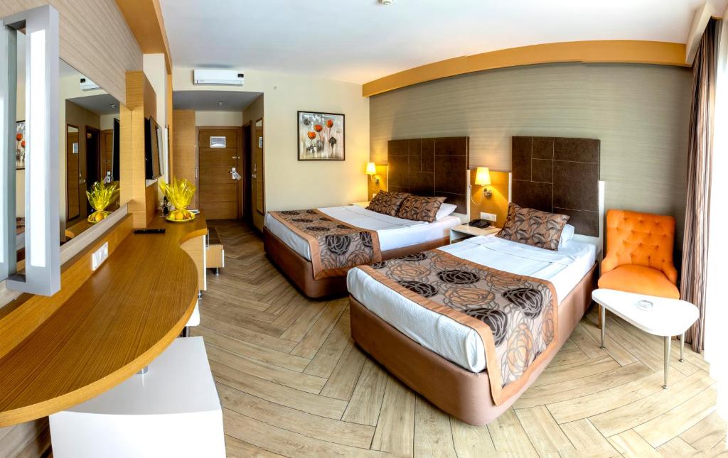 Кровать или кровати в номере My Home Resort Hotel- Ultra All Inclusive