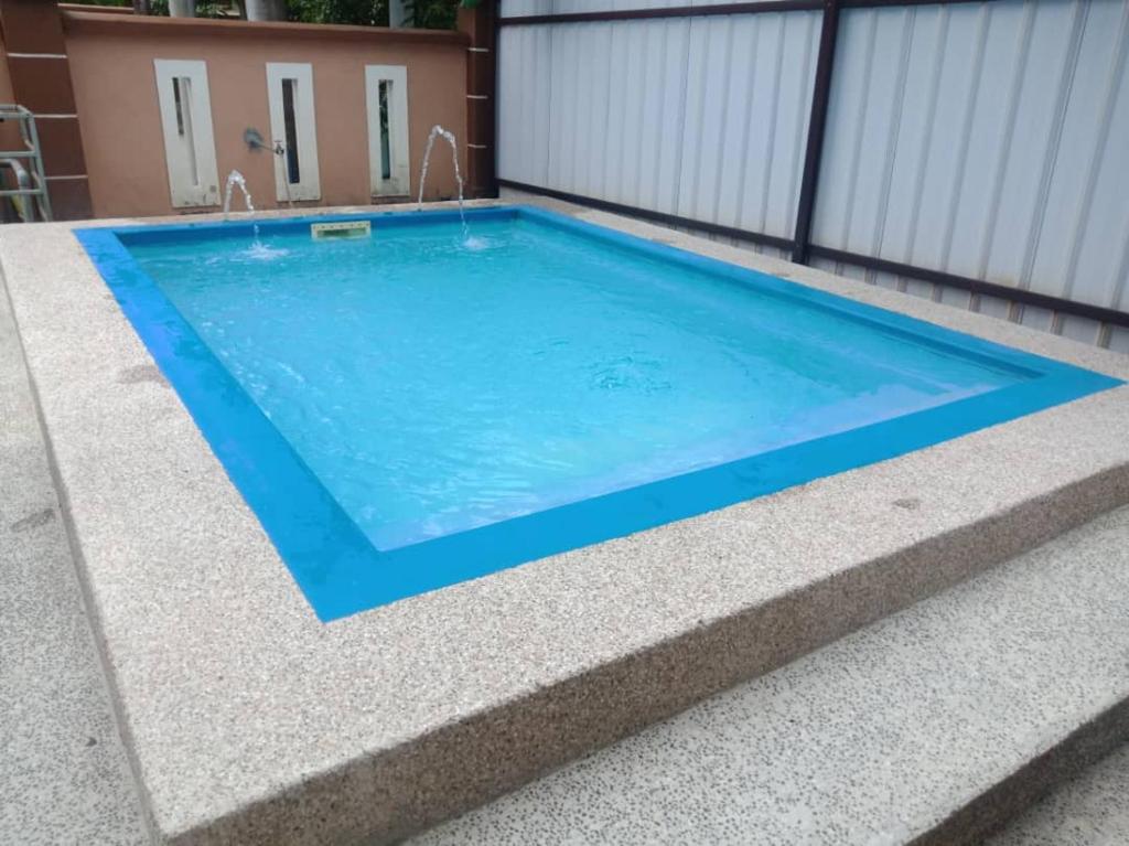 Kolam renang di atau dekat dengan Anugerah Homestay Muslim private pool 5 bilik