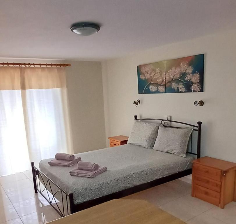 Postel nebo postele na pokoji v ubytování FLORA STUDIOS CORFU - Adults only