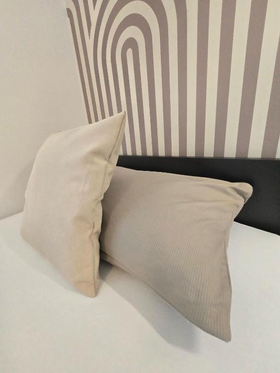 Postel nebo postele na pokoji v ubytování Fair n Square Hotel 24 Stunden Self-Check In