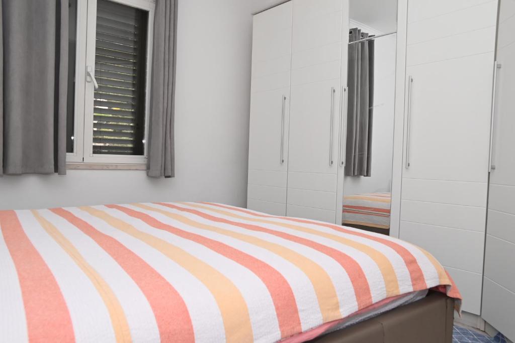 Posteľ alebo postele v izbe v ubytovaní Apartment Oscar