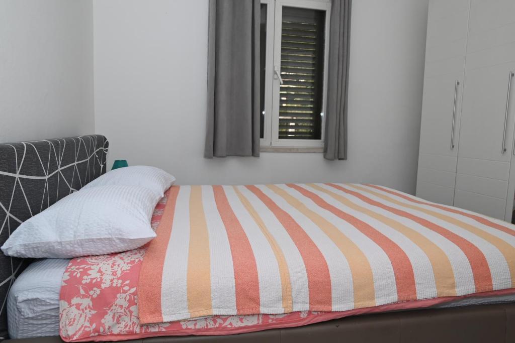 Posteľ alebo postele v izbe v ubytovaní Apartment Oscar