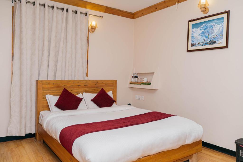 Postel nebo postele na pokoji v ubytování Bardali Restro and Residency