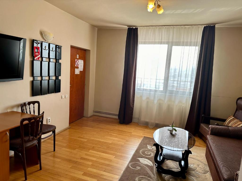 TV a/nebo společenská místnost v ubytování Panoramic Cetatuie