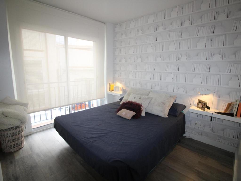 Posteľ alebo postele v izbe v ubytovaní PLAÇA DEL PORT - Magnífico apartamento con vistas al Castellar. - ES-228-76