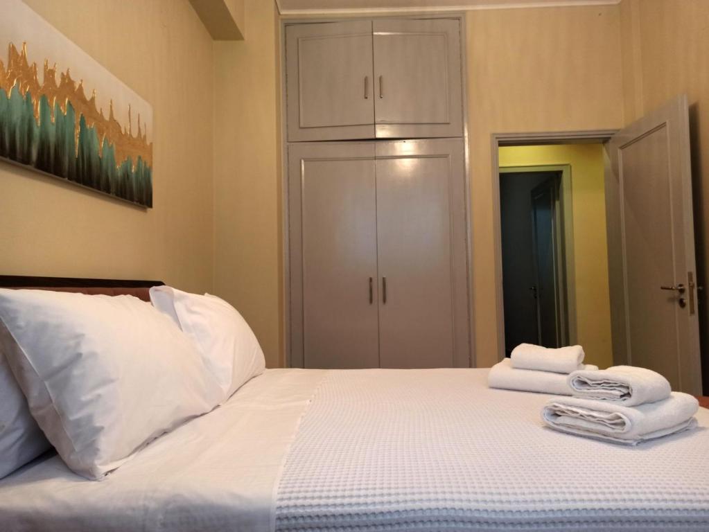 Postel nebo postele na pokoji v ubytování Kallaris Deluxe House