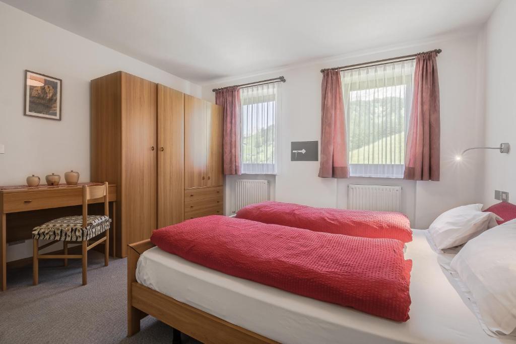 Voodi või voodid majutusasutuse Chalet Pradat toas