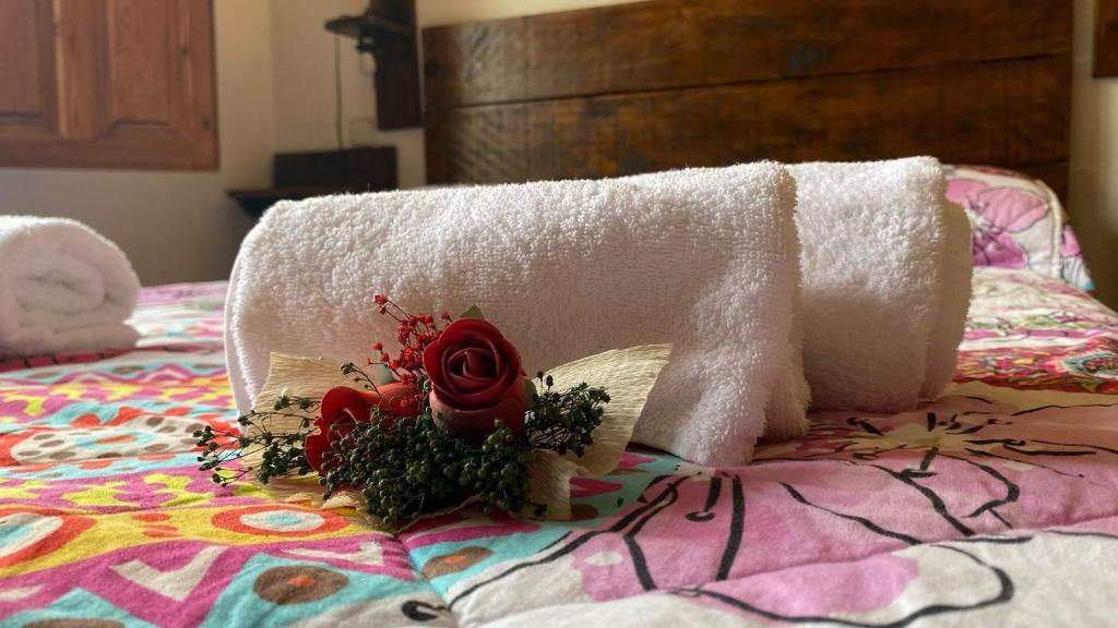 Cama o camas de una habitación en Alojamientos La Dehesa