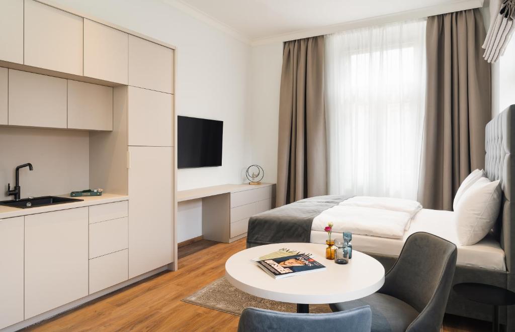 TV a/nebo společenská místnost v ubytování NOBILIS RESIDENCE