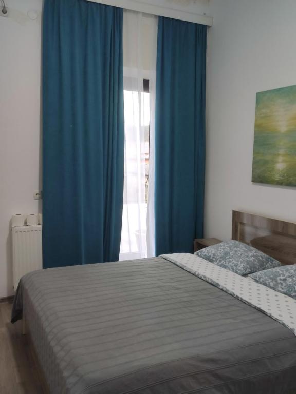 Postel nebo postele na pokoji v ubytování Family Нotel Banuri