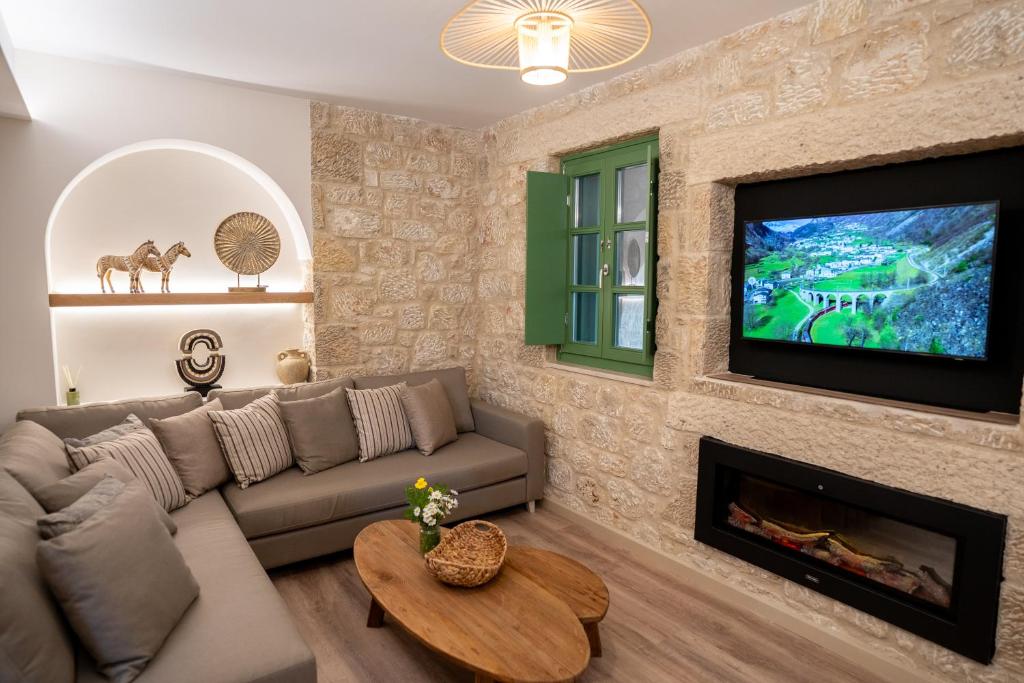 TV a/nebo společenská místnost v ubytování Olvio Suites