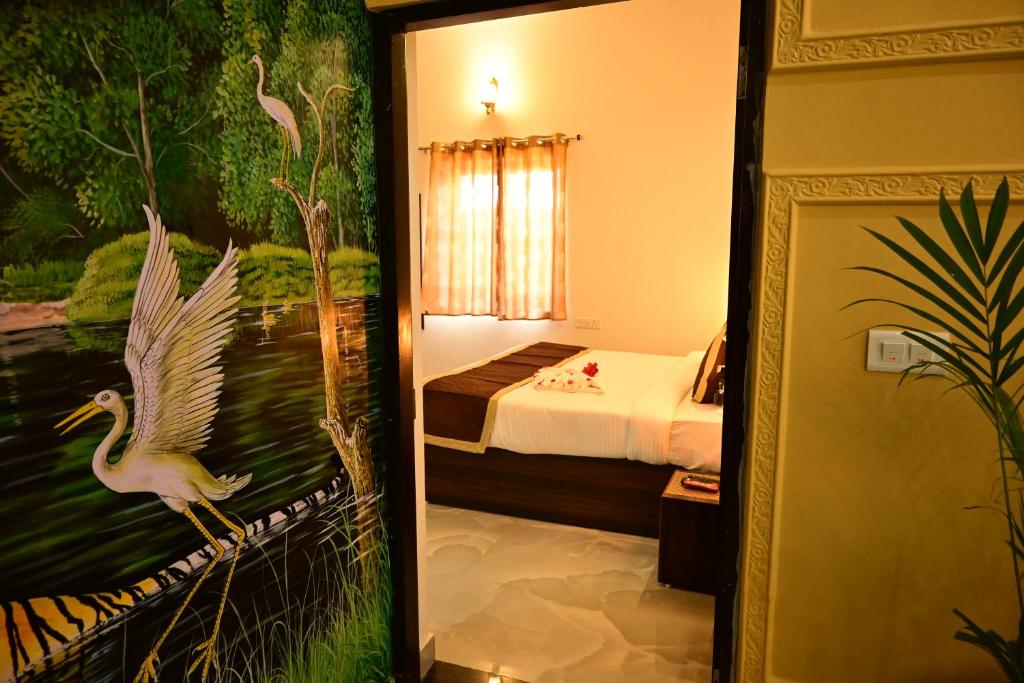 Postel nebo postele na pokoji v ubytování Aijasvan Resort