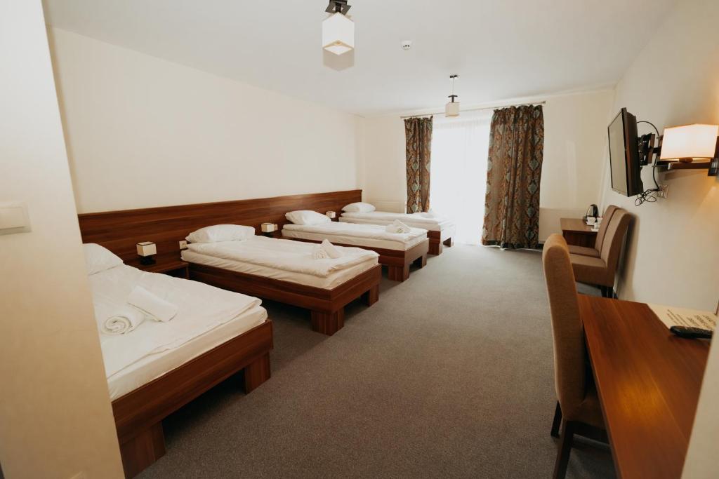 Noclegi - Apartamenty Żołynianka - Habitación Cuádruple Con Baño Privado