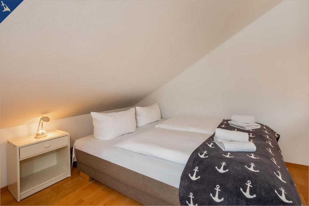 Postel nebo postele na pokoji v ubytování Villa Seeland Villa Seeland App 7