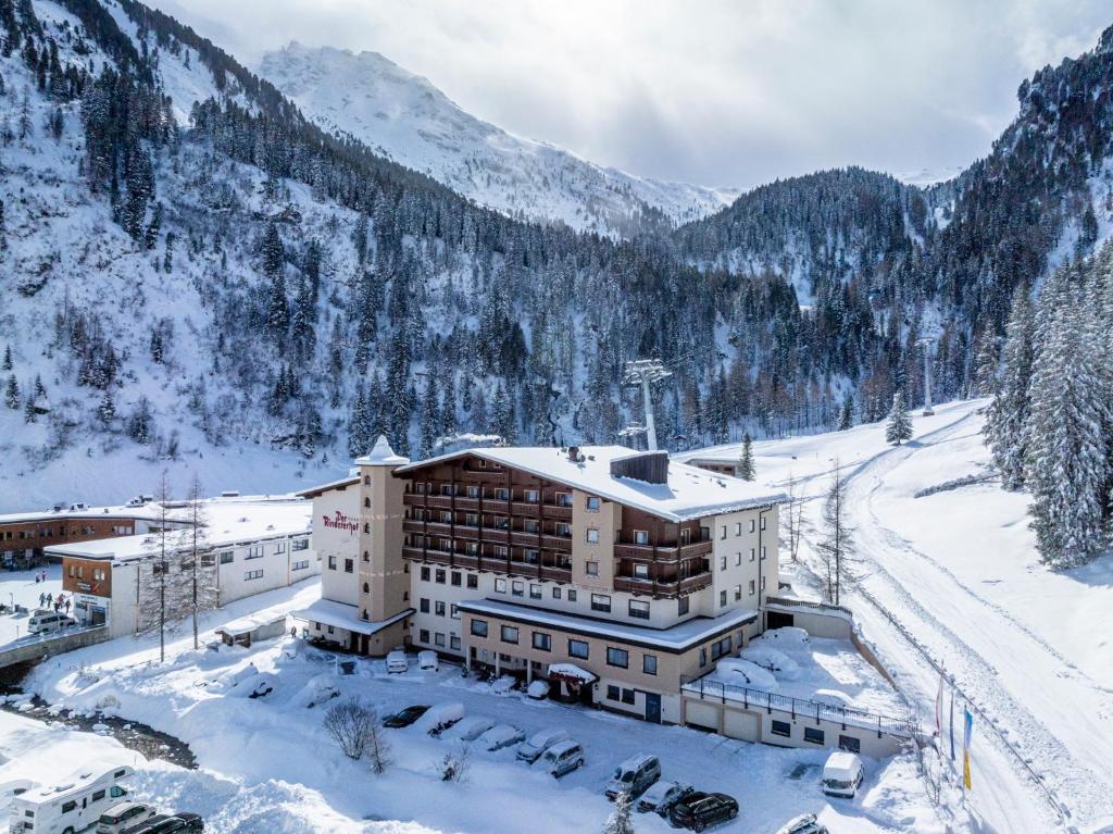 an aerial view of a hotel in the snow at Der Rindererhof in Tux