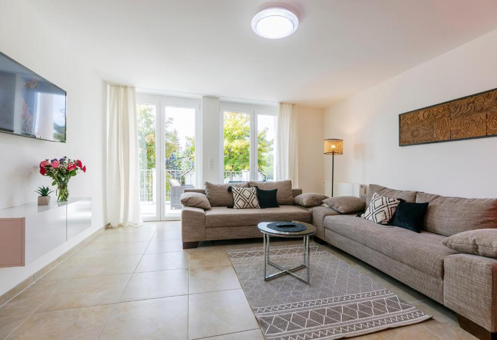 Posezení v ubytování MEMORY - Ferienapartments & Zimmer - Mediterraner Flair in der Rhön