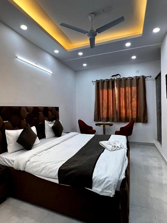 Postel nebo postele na pokoji v ubytování Hotel Trending Stay