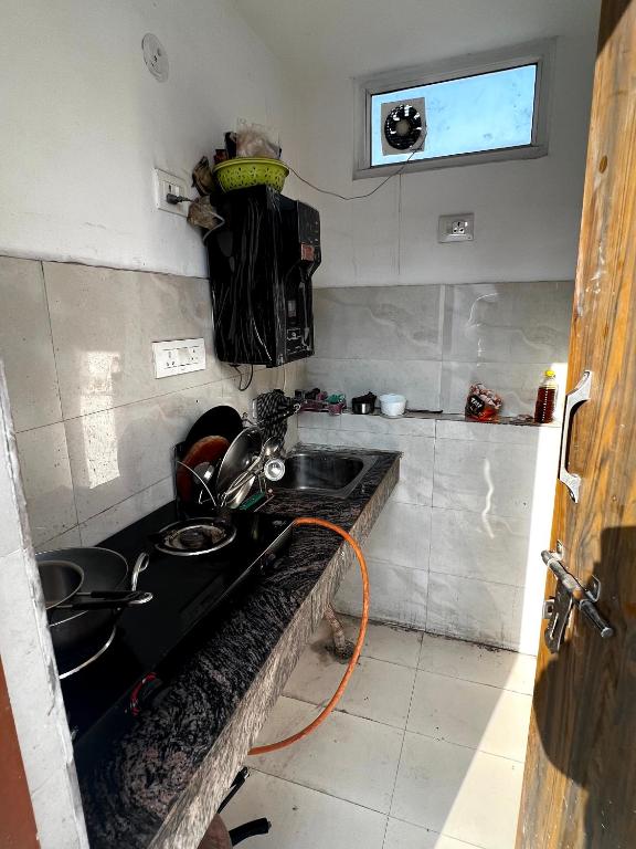 Kuchyň nebo kuchyňský kout v ubytování Hotel Trending Stay