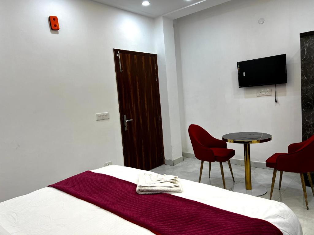 Postel nebo postele na pokoji v ubytování Hotel Trending Stay