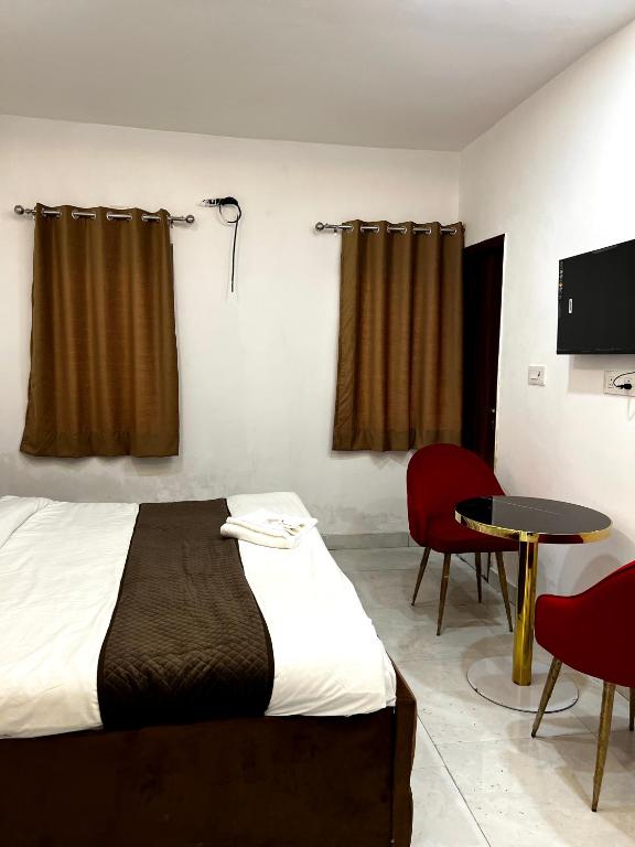 Postel nebo postele na pokoji v ubytování Hotel Trending Stay