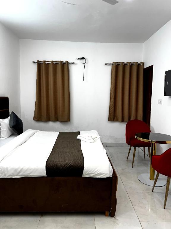 Postel nebo postele na pokoji v ubytování Hotel Trending Stay