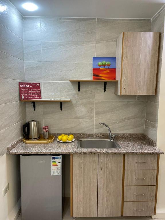 Kuchyň nebo kuchyňský kout v ubytování Classy Hostel