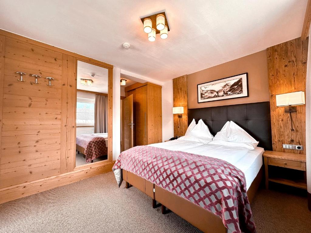 Postel nebo postele na pokoji v ubytování Hotel Das Urbisgut