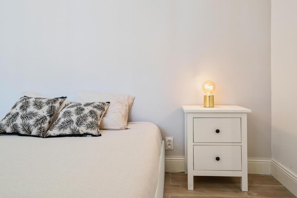 Postel nebo postele na pokoji v ubytování Palais Biagini - Happy Rentals