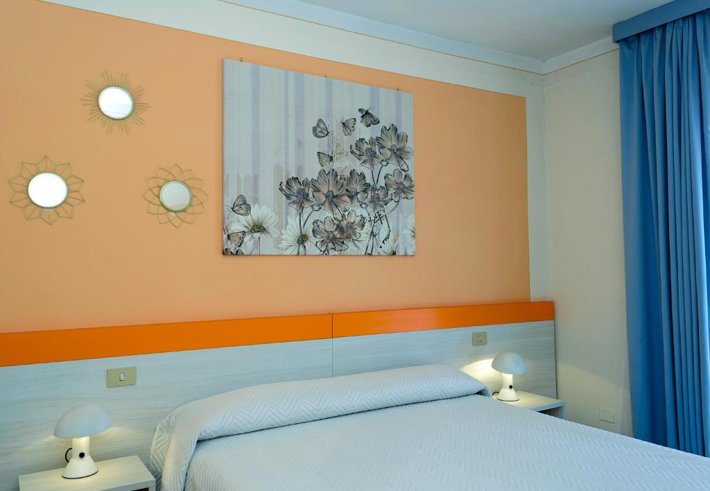 Postel nebo postele na pokoji v ubytování Hotel The Marquee