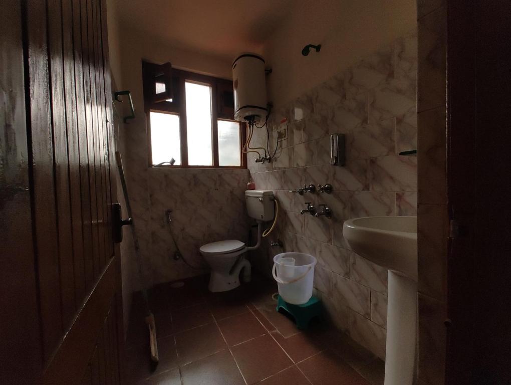 Koupelna v ubytování TSUKIMI Homestay, Naggar, Manali
