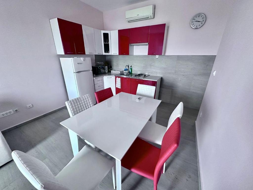 Kuchyň nebo kuchyňský kout v ubytování Gemini Apart