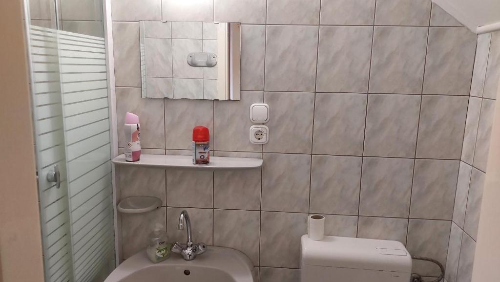 Koupelna v ubytování Napsugár Panzió