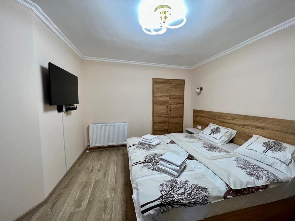 Postel nebo postele na pokoji v ubytování APARTMENT #27