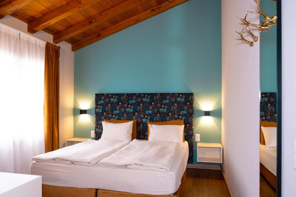Postel nebo postele na pokoji v ubytování Hotel Il Castagno