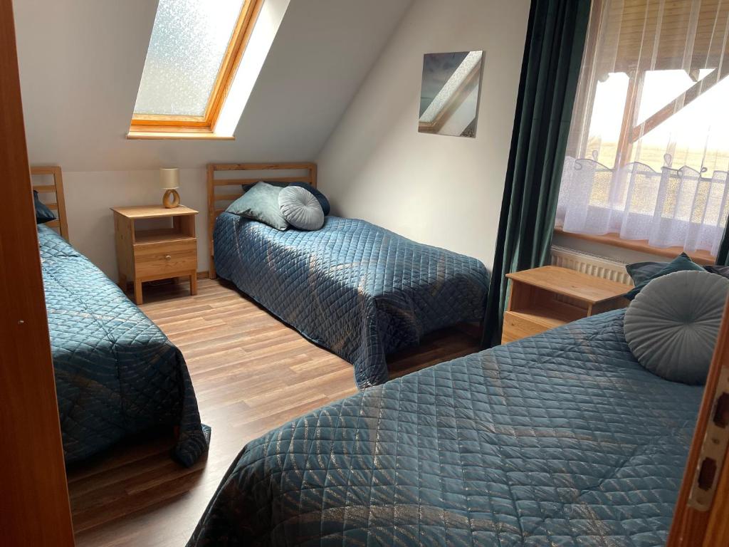 Postel nebo postele na pokoji v ubytování Apartamenty Prima