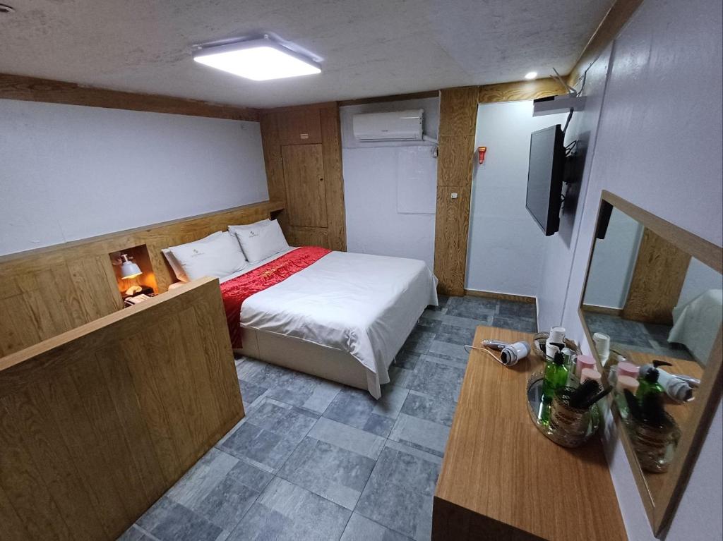 Postel nebo postele na pokoji v ubytování Residence Yeoyu