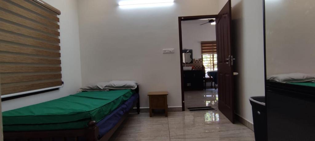 Cama o camas de una habitación en JAWAN VILLA