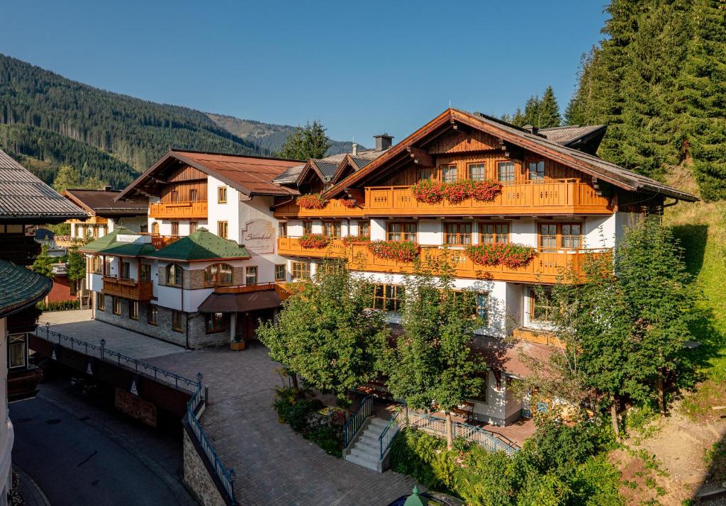 an overhead view of a building in a mountain at Hotel am Sonnenhügel in Filzmoos