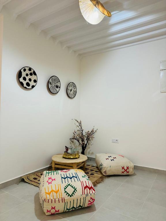Postel nebo postele na pokoji v ubytování Le Majorelle Cozy Flat