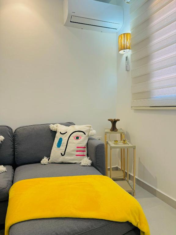 Postel nebo postele na pokoji v ubytování Le Majorelle Cozy Flat