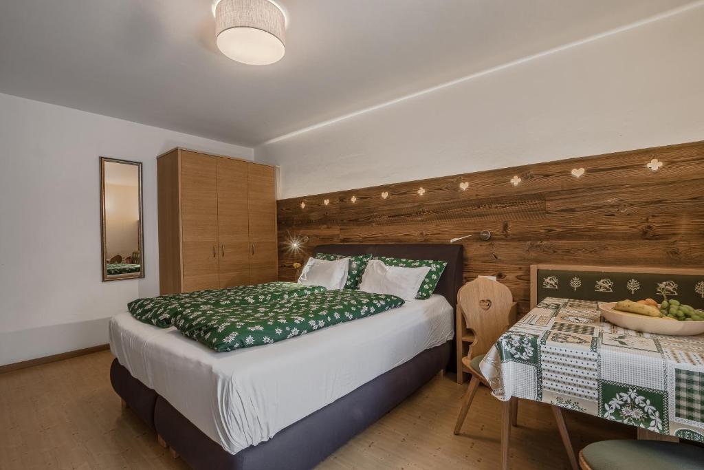 Voodi või voodid majutusasutuse Chalet Pradat toas
