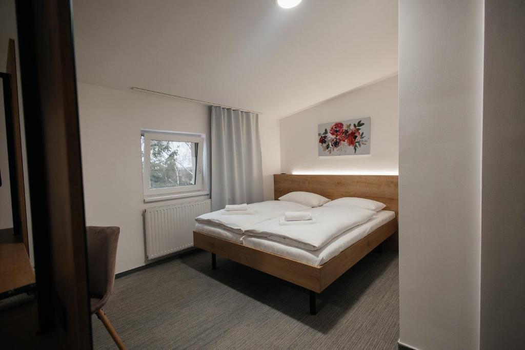 Postel nebo postele na pokoji v ubytování Golden Golem hotel & Spa