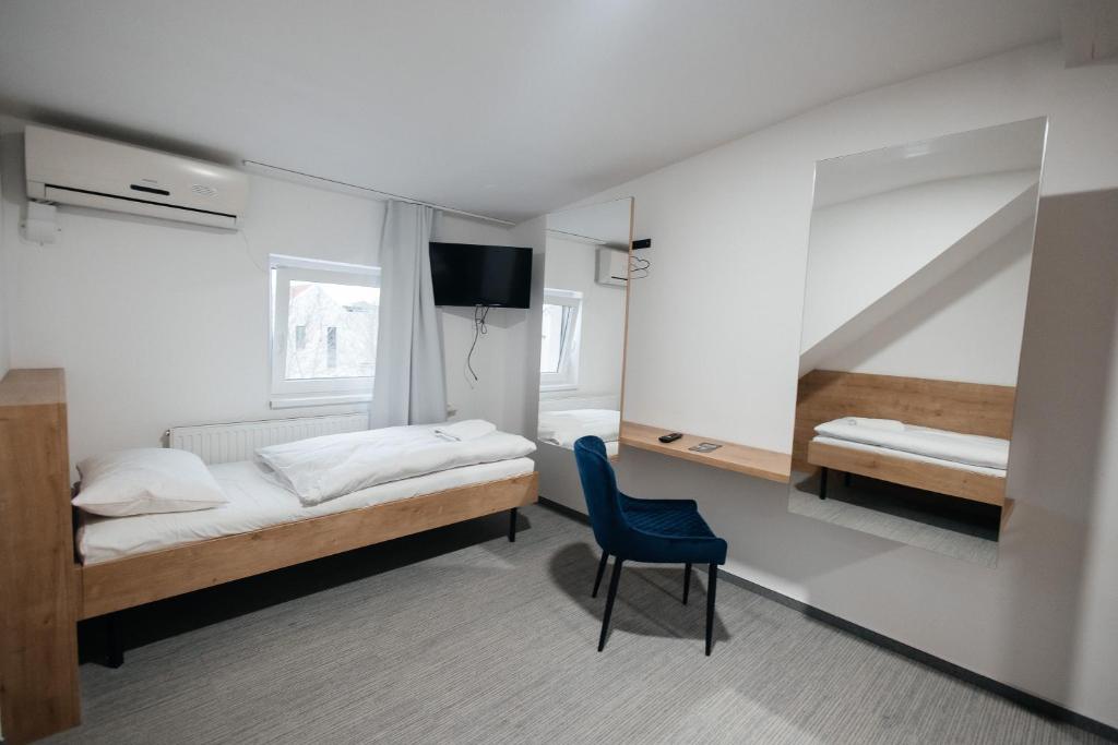 Postel nebo postele na pokoji v ubytování Golden Golem hotel & Spa
