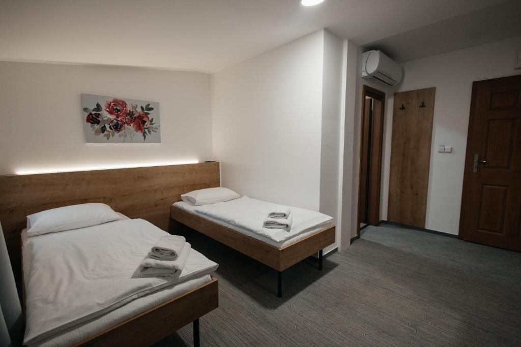 Postel nebo postele na pokoji v ubytování Golden Golem hotel & Spa