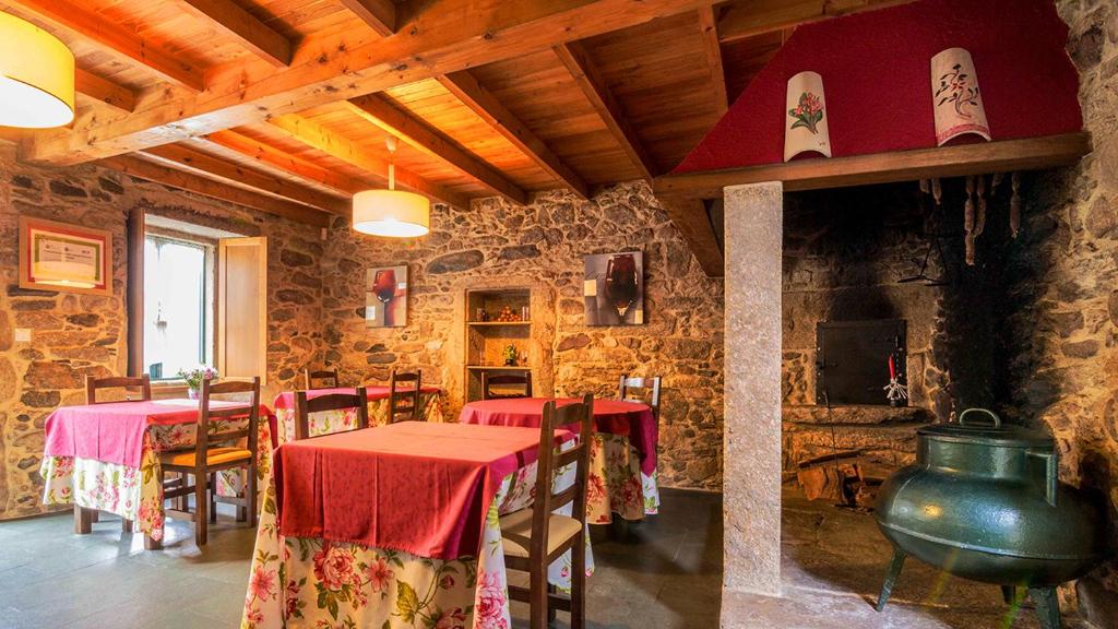 Reštaurácia alebo iné gastronomické zariadenie v ubytovaní Casa do Zuleiro