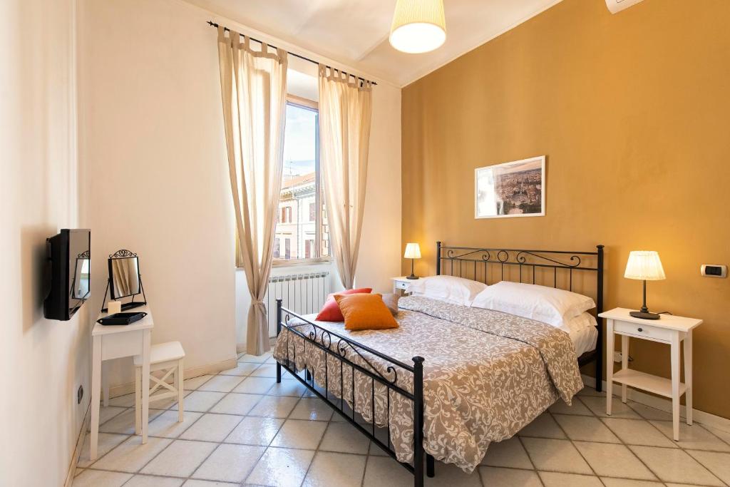 Posteľ alebo postele v izbe v ubytovaní Redseven Rome Apartments