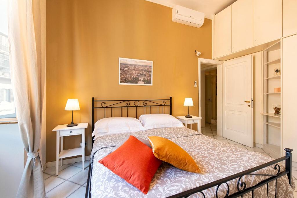 Posteľ alebo postele v izbe v ubytovaní Redseven Rome Apartments